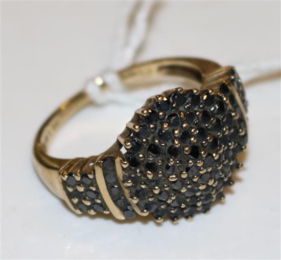 9 carat gold ring with black diamonds